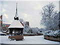 SJ4162 : Paddock Road/Church Road junction and the shelter in the snow by John S Turner