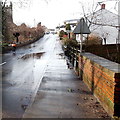 SO4107 : Puddle on Monmouth Road, Raglan by Jaggery