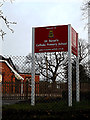 TM4189 : St.Benet's Catholic Primary School sign by Geographer