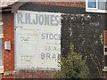 SJ8989 : Half a Ghost Sign by Gerald England