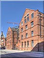 SJ8398 : Bloom Street, Salford Corporation Model Lodging House by David Dixon