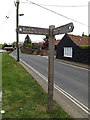 TM4291 : Angles Way footpath sign by Geographer