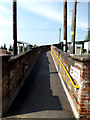 TM4290 : Ramp to the footbridge & Trains by Geographer