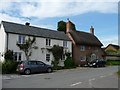 SU1057 : Contrasting houses, Wilsford by Christine Johnstone