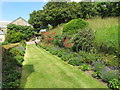 SW8458 : Herbaceous border at Trerice by David Hawgood