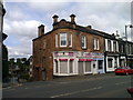 NS6960 : The corner of Gardenside Street and Main Street, Uddingston by Elliott Simpson