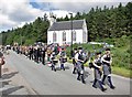 NG2547 : Parade passing the Parish Church by Richard Dorrell