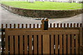 TG1927 : St Michael and All Angels, Aylsham: lychgate and commemorative bench, detail by Christopher Hilton