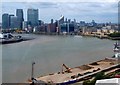 TQ3980 : Emirates Cable Car - Thames view to Canary Wharf by Rob Farrow