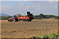 TA1181 : Farmer spreading muck by Pauline E