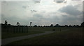 TQ4783 : View of the A13 and the wind turbine at Beckton from Goresbrook Sports Ground by Robert Lamb