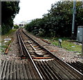 SZ3295 : End of the third rail near a Lymington level crossing by Jaggery