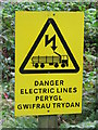 SH7753 : Bilingual Warning Sign by Keith Evans