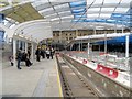 SJ8499 : Refurbished Metrolink Platform at Manchester Victoria (February 2015) by David Dixon