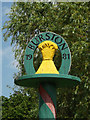 TM1383 : Burston Village sign by Geographer