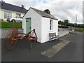  : A tiny house and old farm machinery, Dullaghan by Kenneth  Allen