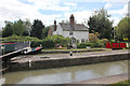 SP4264 : Shop Lock 12 and Shop Lock Cottage, Grand Union Canal by Jo and Steve Turner