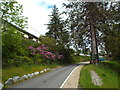 NM8980 : Glenfinnan station approach road by Malc McDonald