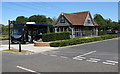 SP5821 : Shuttle bus and large wooden bus shelter, Pingle Drive, Bicester by Jaggery