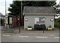 SN3610 : Noticeboard and bench at the edge of  The Square, Ferryside by Jaggery