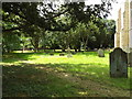 TM1469 : All Saints Churchyard by Geographer