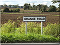 TM0968 : Grange Road sign by Geographer