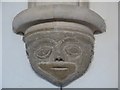 TQ1605 : Sompting - St Mary's - Carved grotesque head by Rob Farrow