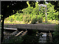 SE2734 : Railway bridge over the canal at Armley by Stephen Craven