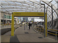 SJ8498 : Manchester Victoria station: approach to tram stop by Stephen Craven