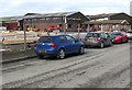 SJ2206 : Cars parked in a turning area, Welshpool by Jaggery