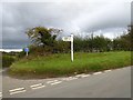 SX8466 : Signpost at Dainton Elms Cross by David Smith