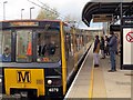 NZ3464 : Train at Simonside Metro Station (Platform 1) by Andrew Curtis