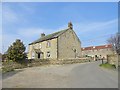 NZ1447 : West farmhouse at Newbiggin by Robert Graham