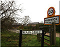 TL3758 : Main Street & Hardwick Village Name sign by Geographer