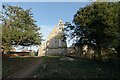 SK9925 : Trees in the churchyard by Bob Harvey