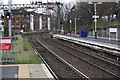 NS4871 : A west view along the platforms at Dalmuir railway station by Garry Cornes