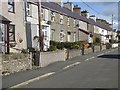 SH4468 : Village street in Llangaffo by Oliver Dixon