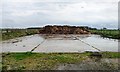 SE5458 : Muck heap on hardstanding, west of Shipton by Christine Johnstone