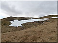 NN4716 : Snow patch in upper branch of Allt Fathan Glinne by Alan O'Dowd