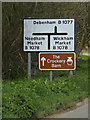 TM1853 : Roadsigns on the B1077 Ashbocking Road by Geographer