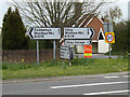 TM1853 : Roadsigns on the B1078 Ashbocking Road by Geographer