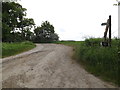 TM0952 : Footpath & entrance to Roebuck Farm by Geographer