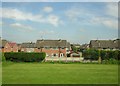 SJ7156 : Backs of houses on Bray Close, from the railway, Crewe by Christopher Hilton