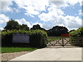 TM0946 : Entrance to Woodlands Farm by Geographer