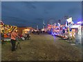 NZ2466 : Line of rides, The Hoppings funfair, Newcastle upon Tyne by Graham Robson