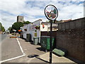 TL9978 : Hopton Village sign by Geographer