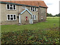 TL9780 : Post Office Cottages Victorian Postbox by Geographer