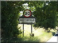 TM0174 : Wattisfield Village Name sign on the A143 Diss Road by Geographer