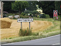 TM0275 : Wattisfield Village Name sign on the A143 Snape Hill by Geographer