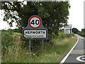 TL9974 : Hepworth Village Name sign & Roadsign by Geographer